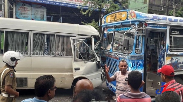 இரு பேருந்துகள் நேருக்கு நோ் மோதி விபத்து..! இருவா் படுகாயம்.